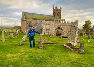 ancient Scottish church surrounded by ancient gravestones