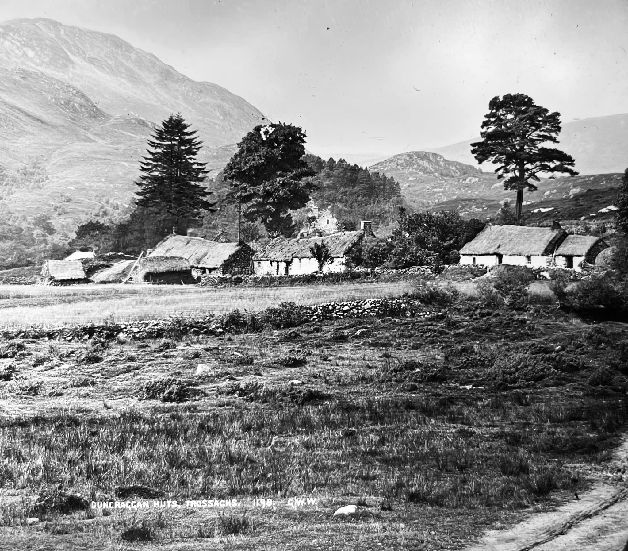 old black and white print of 3 Scottish cottages from the late 1800s