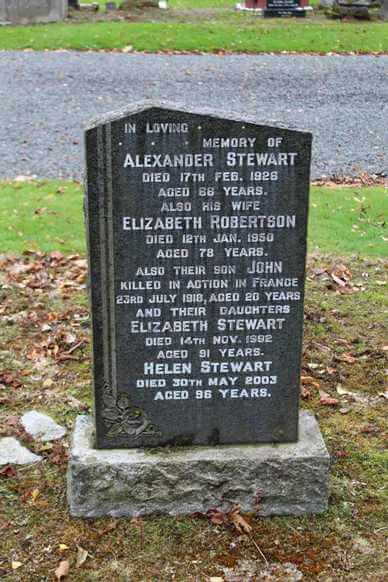 inscribed black marble gravestone